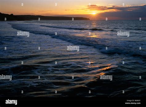 Evening sunset over Whitby beach, Whitby, North Yorkshire Stock Photo ...