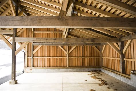 Timber framed carriage shed with firewood storage. | Timber framing, Timber garage, Timber frame ...