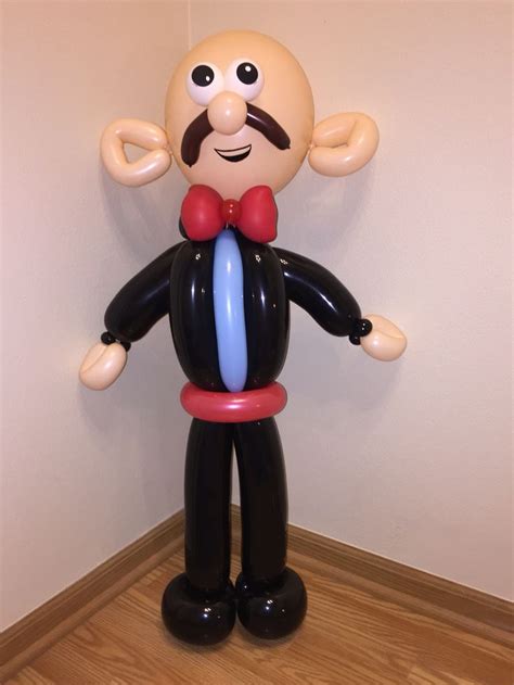 A balloon man in a tux. | Balloon art, Balloons, The balloon