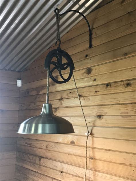 Repurposed well pulley | Shed decor, Shed lighting ideas, Shed ceiling ideas