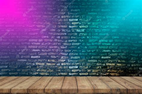 Premium Photo | Brick wall background, wood table top, neon light