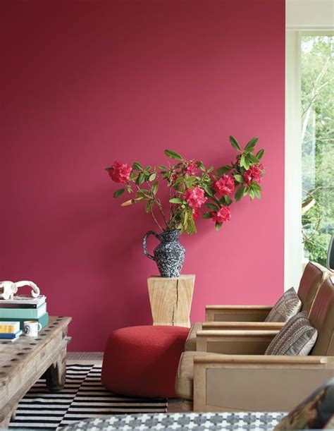 Afternoon tea in the sitting room is never dull when paired with a deliciously deep pink feature ...