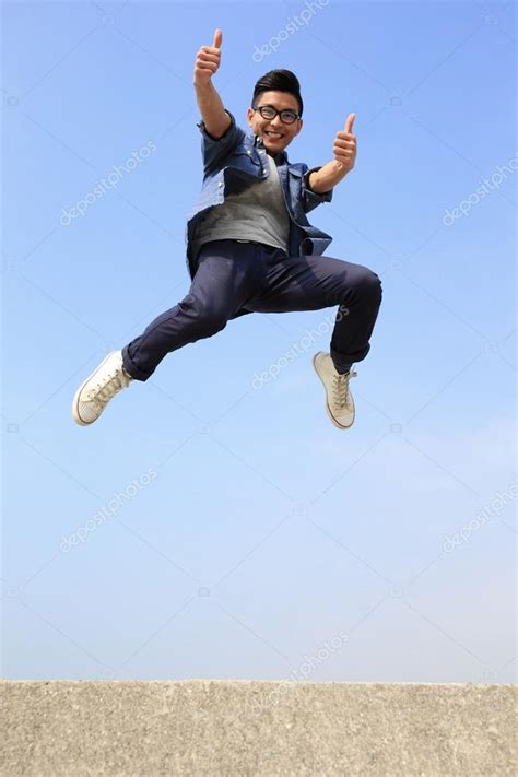 Happy man jumping ⬇ Stock Photo, Image by © ryanking999 #70135653