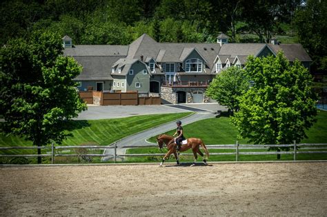 Move across the pond to this incredible equestrian facility with 87 ...