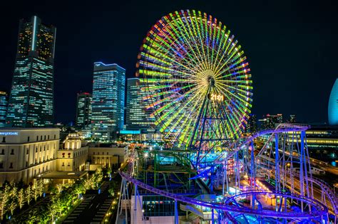 Multicolored Led Lights on Ferris Wheel and Roller Coaster during Nighttime · Free Stock Photo