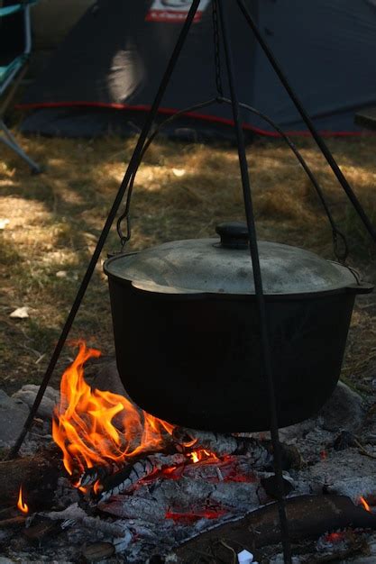 Premium Photo | Cauldron on an open fire cooking camping