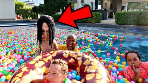 BALL PIT PRANK IN OUR SWIMMING POOL!! - YouTube