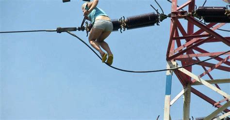 Woman hallucinating on drugs climbs electricity pylon thinking it was a bridge - World News ...