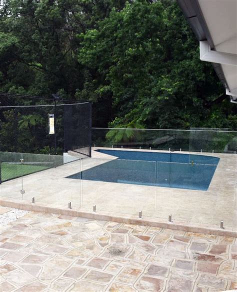 Limestone coping and fully tiled pool - PavePro