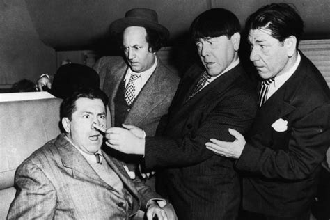 Eye Jabs & Head Raps: Rare Behind-the-Scenes Photos of The Three Stooges | TIME.com