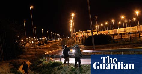 Migrants try to enter Eurotunnel Calais terminal – in pictures | UK news | The Guardian