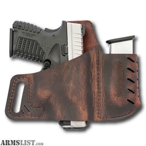 ARMSLIST - For Sale: versacarry owb leather holster with mag well