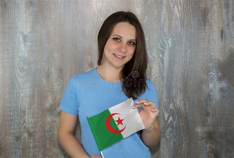A Young Smiling Woman with a Algeria Flag in Her Hand. Stock Image - Image of learn, adult ...