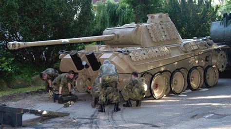 German pensioner given hefty fine for WW2 tank in house - BBC News