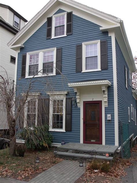 Hamilton Blue House with White Trim and Black Shutters