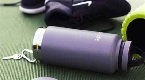 Fully-insulated water bottle with integrated storage: Bindle Bottle - Just A Guy Thing