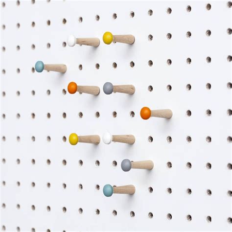 Coloured Pegboard Pegs By Block Design | Pegboard accessories, Wooden pegboard, Peg board