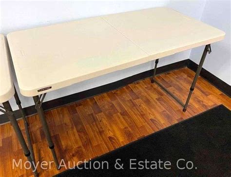 4' Lifetime Folding Table, Adjustable Height, 22"-36" Tall, Folds in ...