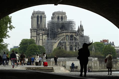 Notre Dame Cathedral Fire Extinguished; Spire Collapsed, Towers Still ...