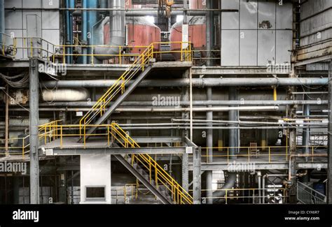 View of industrial factory interior with stairs Stock Photo - Alamy