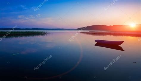 Sunrise over the lake — Stock Photo © photoff #13616896