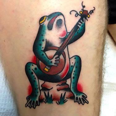 Cartoon Musician Frog Tattoo Idea | Frog tattoos, Wood tattoo, Traditional tattoo dog