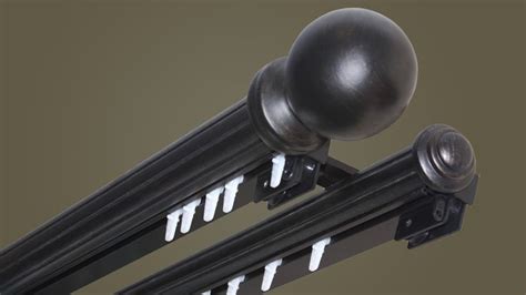 an image of a metal pole with two balls attached to the top and one ...