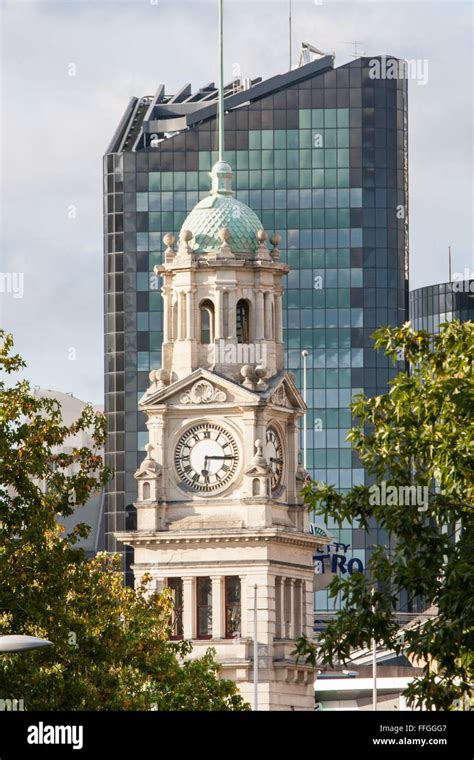 The Town Hall Clock Tower on Queen Street and modern office building ...