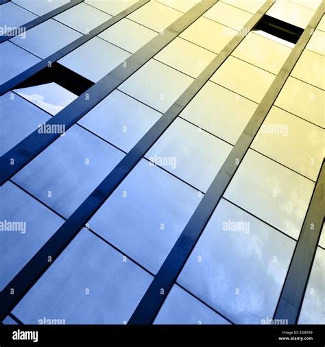 Windows of office building and sky reflection Stock Photo - Alamy