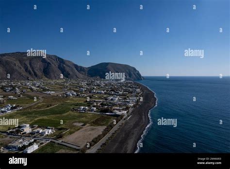 An aerial view of Santorini island surrounded by buildings Stock Photo - Alamy