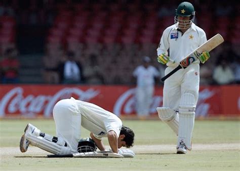 Misbah-ul-Haq celebrates his century while debutant Yasir Arafat looks on | ESPNcricinfo.com