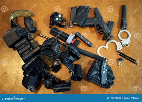 Everyday Law Enforcement Gear and Duty Belt Editorial Image - Image of points, pens: 178376685