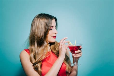 Free Photo | Young woman drinking cocktail