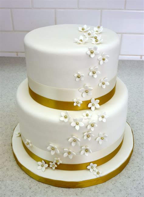 50th Anniversary Cake w/ gold-centered stephanotis | 50th anniversary ...