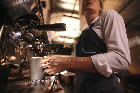 Barista making coffee on coffee maker machine – Jacob Lund Photography ...