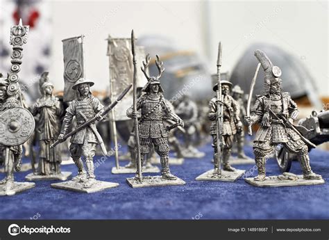 Tin soldiers samurai toys — Stock Photo © ryzhov #148918687