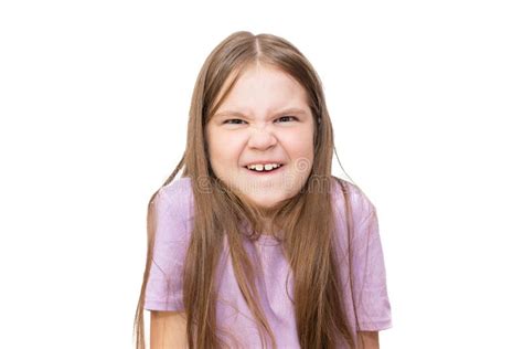 Little Girl Makes an Angry Face. Isolated on a White Background. Stock Image - Image of ...