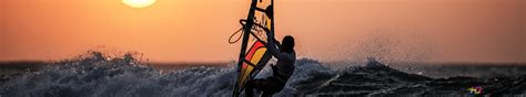 Windsurfing in sunset 6K wallpaper download