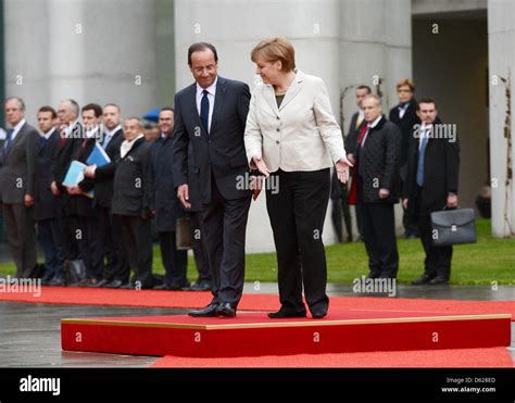 German Chancellor Angela Merkel (CDU) welcomes new French President ...