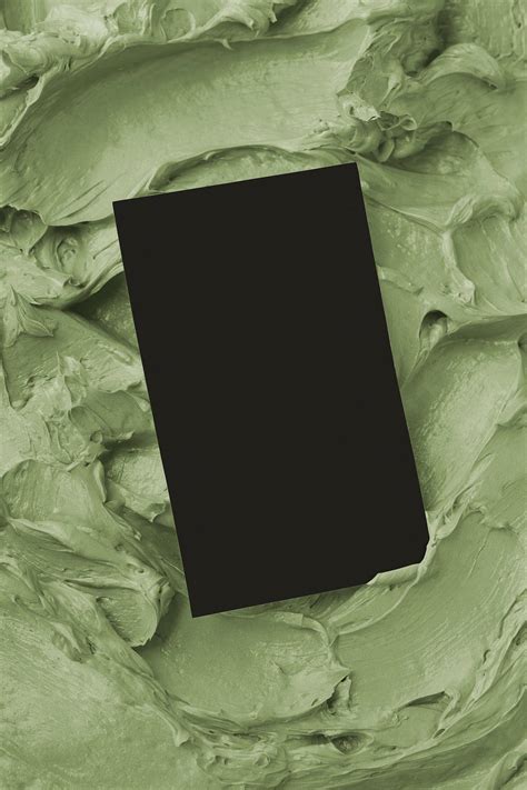 Black business card on green | Free Photo - rawpixel