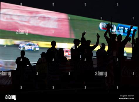 Concord, NC, U.S.May 26, 2013. Fans cheer during the COCA-COLA 600 race ...