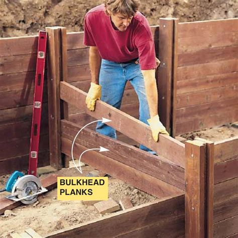 How to Build a Treated Wood Retaining Wall | Family Handyman