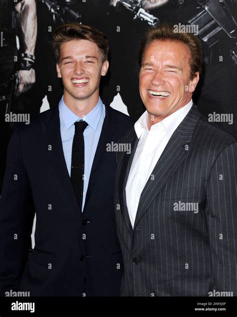 Arnold Schwarzenegger and his son Patrick attends the "The Expendables 2" Los Angeles Premiere ...