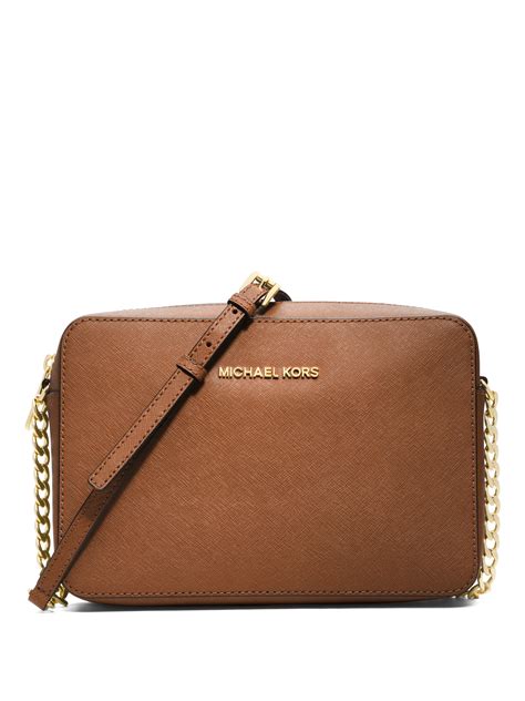 Michael michael kors Jet Set Travel Saffiano Crossbody Bag in Brown (LUGGAGE) | Lyst