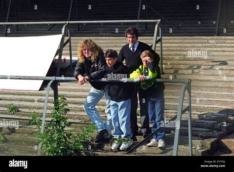 Robert Plant and his son Logan stand on the derelict North Bank (Cow Stock Photo, Royalty Free ...