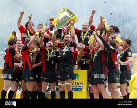 Saracens' captain Steve Borthwick lifts the cup after victory during ...