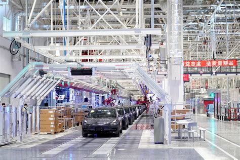 Tesla shows off the inside of its China factory in new video where you can see the Model 3 being ...