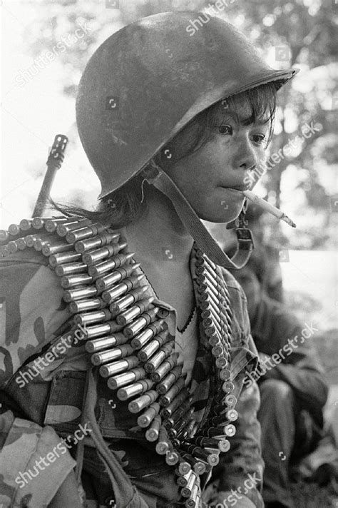 A young girl fighting for the Lon Nol regime against the Khmer Rouge, Cambodian civil war, circa ...