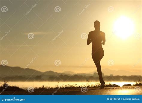 Runner Woman Silhouette Running At Sunset Stock Photo - Image: 50129761