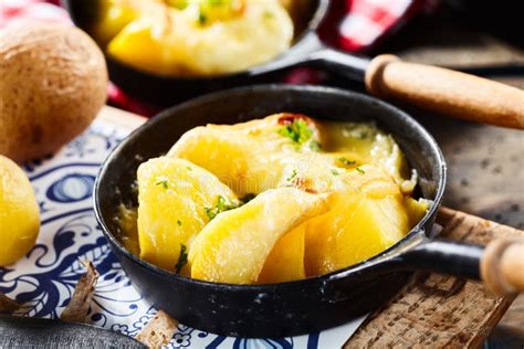 Tasty Serving of Raclette on Potatoes with Herbs Stock Image - Image of dairy, diet: 82632831